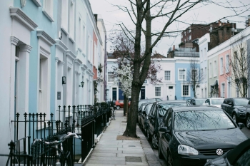 pastel coloured buildings on a Notting Hill street