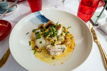 a seafood dish on a table in a restaurant