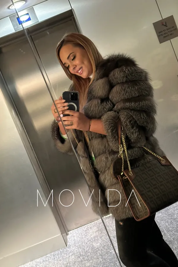 Ayla taking an elevator selfie  Profile Image